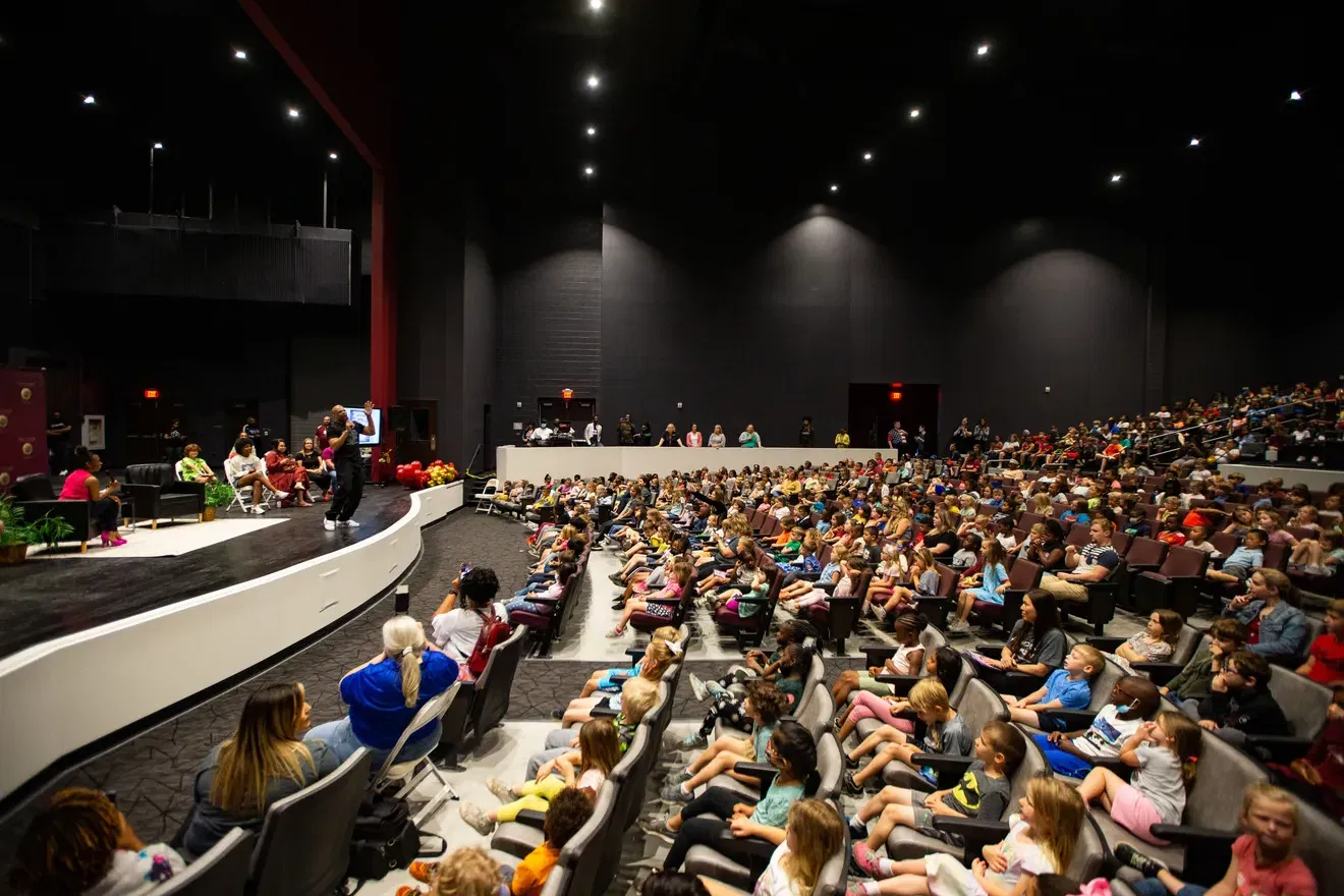 School Children listening to a speaker