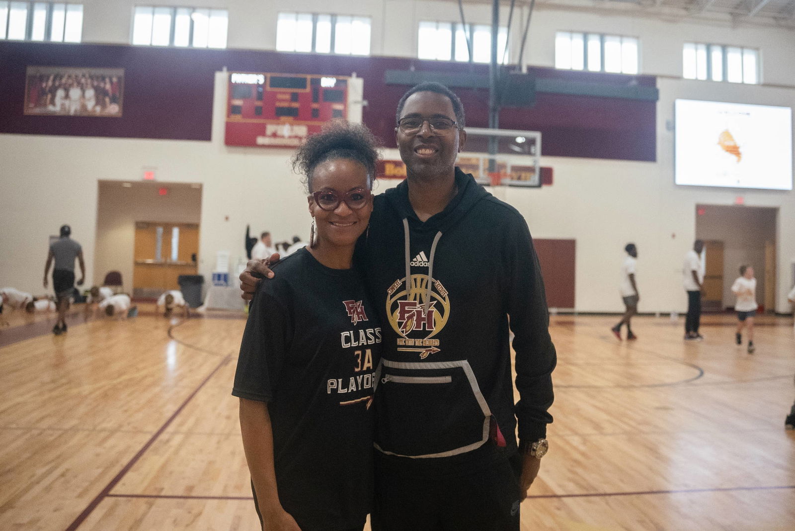 Charlie and Tonja Ward at a basketball clinic